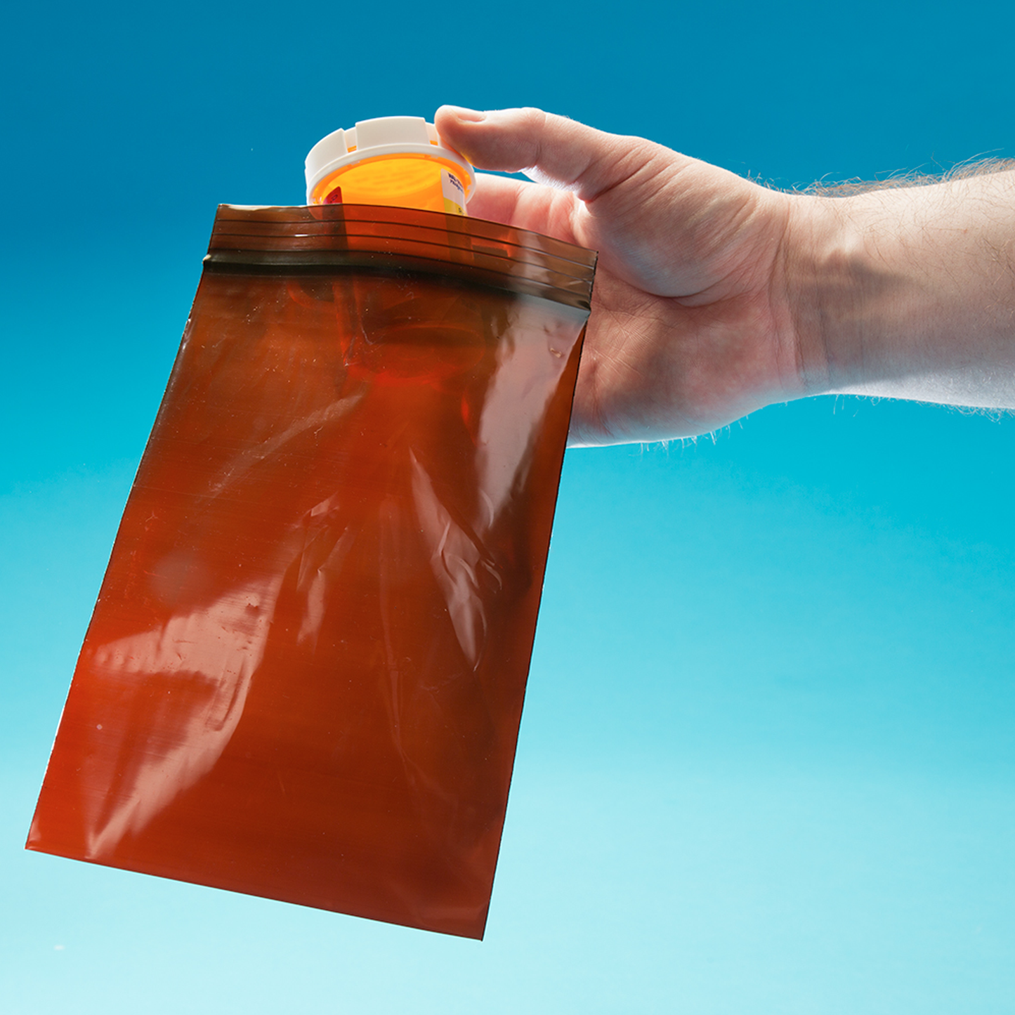 color: amber ~ size 12" x 12" (1000 count) ~ alt: Amber 3.0 mil Re-sealable Bags